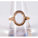 A 9CT GOLD AND OPAL RING. 3 grams. Q.