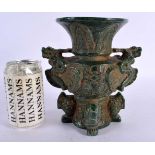 A CHINESE CARVED JADE TYPE LIBATION CUP VASE 20th Century. 20 cm x 15 cm.