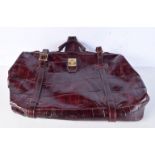 A vintage Los Robles blood red leather holdall. 38 x 57cm.