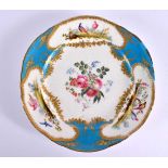 Sevres turquoise bordered plate, the centre painted with flowers, under raised gilt floral festoons,
