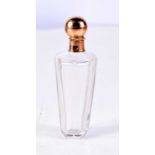 AN ANTIQUE 18CT GOLD TOPPED SCENT BOTTLE. 46 grams. 9 cm x 2.75 cm.