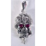 A SILVER SKULL PENDANT. 12.9 grams. 5.5 cm x 2.5 cm.