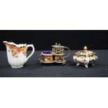 A Davenport Imari pattern cruet set together with a Crown Derby lidded pot and a jug 7 cm (3).