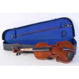 A cased Czechoslovakian half size violin and bow label The metro violin class organisation 52 cm (