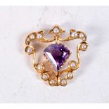 A 15CT GOLD AMETHYST AND PEARL PENDANT. 4.1 grams. 2.5 cm x 2.5 cm.
