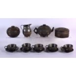 A RARE 19TH CENTURY CHINESE CARVED COCONUT AND PEWTER TEASET Qing. Largest 20 cm wide. (qty)