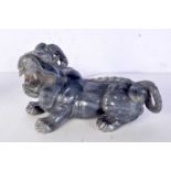 A Chinese carved jade figure of a mythical ram. 21 cm wide.