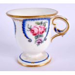 Sevres sobert cup painted with flowers in blue feather edged panels, interlaced L’s smudged, four