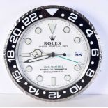 A Contemporary Rolex dealership style wall clock 34 cm.