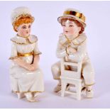 19th century Royal Worcester pair of figures of two children seated on a chair, decorated with