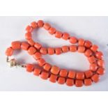 A VICTORIAN 15CT GOLD AND CORAL NECKLACE. 45.5 grams. 43 cm long.