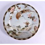 A LATE 19TH CENTURY JAPANESE MEIJI PERIOD PORCELAIN PLATE painted with a bird in foliage. 21 cm