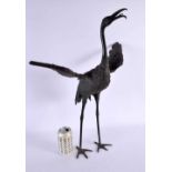 A LARGE 19TH CENTURY JAPANESE MEIJI PERIOD BRONZE OKIMONO modelled as a standing crane. 56 cm x 24