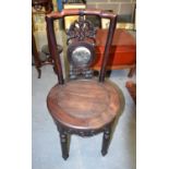 A 19TH CENTURY CHINESE CARVED HARDWOOD CHAIR Qing. 90 cm x 40 cm.