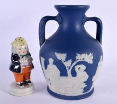 AN ANTIQUE ADAMS AND BROMLEY TWIN HANDLED BLUE BASALT PORTLAND VASE together with an antique