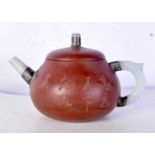 A Chinese Yixing pottery teapot, formed with jade handle and incised with calligraphy. 15.5 cm