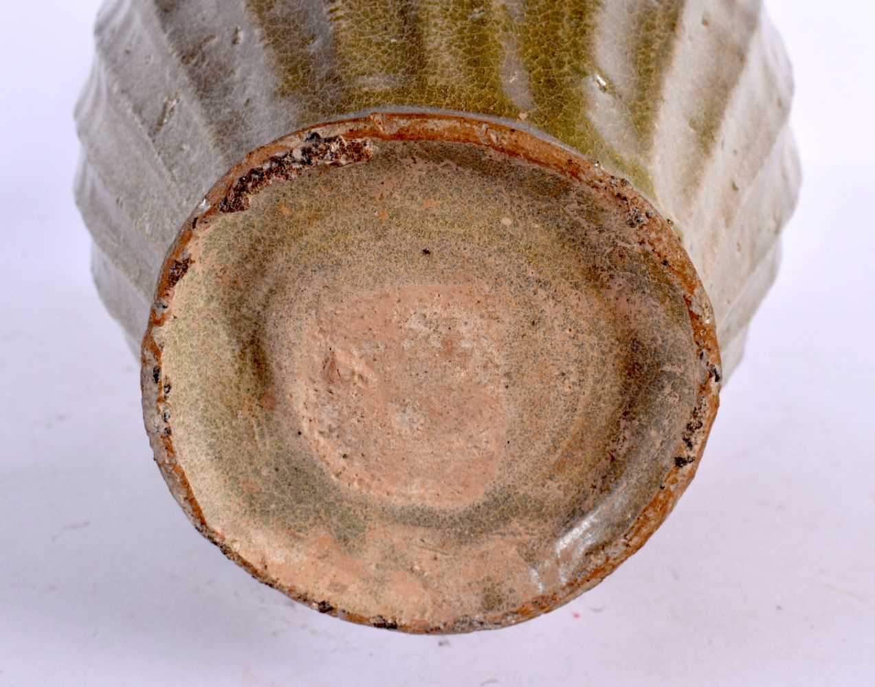 A 15TH/16TH CENTURY KOREAN CELADON GLAZED POTTERY VASE with lotus type borders. 28 cm x 12 cm. - Image 5 of 5