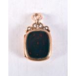 AN ANTIQUE 15CT GOLD AND BLOODSTONE LOCKET. 6.9 grams. 3.25 cm x 1.75 cm.