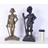 A heavy antique cast iron soldier door stop together with a brass soldier doorstop 36 cm.(2)