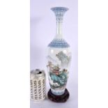 A BOXED CHINESE REPUBLICAN PERIOD FAMILLE ROSE EGG SHELL PORCELAIN VASE painted with landscapes.