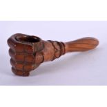 AN ANTIQUE TREEN NUT CRACKER. 20 cm long.