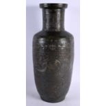 A LARGE 19TH CHINESE BRONZE DRAGON ROULEAU VASE Qing. 44 cm x 17 cm.