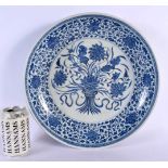 A LARGE CHINESE BLUE AND WHITE PORCELAIN DISH probably 18th/19th century, painted with bouquets of