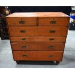 A Cavalier 6 drawer brass bound oak chest by Army and Navy with a rare secret velvet lined drawer.