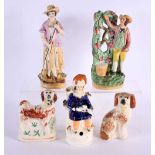 THREE 19TH CENTURY STAFFORDSHIRE POTTERY FIGURES together with a pair of similar spaniels. Largest