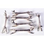 SIX SILVER KNIFE HARE KNIFE RESTS. 352 grams. 9 cm x 3.5 cm. (6)