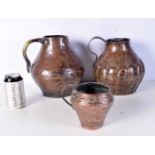 17/18th Century Middle Eastern Islamic Copper Alloy jug together with another similar and a twin