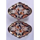 A PAIR OF 19TH CENTURY DERBY IMARI PORCELAIN DISHES painted with flowers. 24 cm x 18 cm.