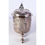 A LARGE ANTIQUE CONTINENTAL SILVER STEIN decorated with figures and fruiting pods. 877 grams. 23.5