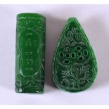TWO CHINESE CARVED JADE TOGGLES 20th Century. Largest 4 cm long. (2)