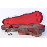 A cased violin with Medio Fino label 56 cm. (2)