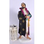 A LARGE UKRAINIAN RUSSIAN USSR LOMOSONOV PORCELAIN FIGURE OF A MALE modelled wearing a black matt