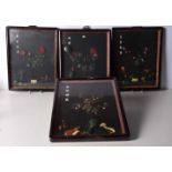 A collection of framed Chinese Jade and hardstone displays. 36 x 29cm (4).