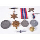 A WW 2 1939-1945 war medal together with military badges,Reform bill medallion etc (9).