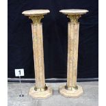 A pair of marble and gilt metal column stands 102 cm (2).