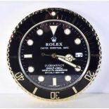 A Contemporary Rolex dealership style wall clock 34 cm.