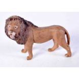 A VIENNA COLD PAINTED BRONZE LION. 9.5 cm x 6.75 cm.