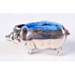 AN EDWARDIAN SILVER PIG PIN CUSHION. 7.2 grams. Birmingham 1905. 4.75 cm x 2.5 cm.