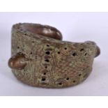 A LARGE 18TH/19TH CENTURY MIDDLE EASTERN BRONZE CUFF BANGLE. 13 cm x 13 cm.