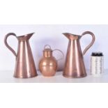 A pair of vintage copper jugs together with another copper jug 21 cm (3).