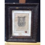 A framed etching on linen of the face of Jesus and its bears a wax seal and an ink stamp for the