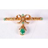 A VICTORIAN YELLOW METAL AND EMERALD BROOCH. 7.2 grams. 5 cm x 3 cm.