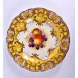 Royal Worcester plate painted with fruit, peaches and grapes, yellow and highly gilt border, painted