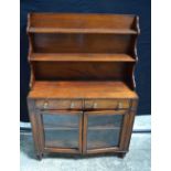 An antique mahogany dwarf book case with glass fronted doors 122 x 81 x 32 cm.