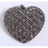 A SILVER AND DIAMOND HEART PENDANT. 12 grams. 4.25 cm wide.