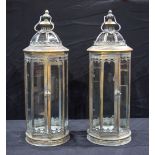 A pair of metal and glass lanterns 59 cm (2).